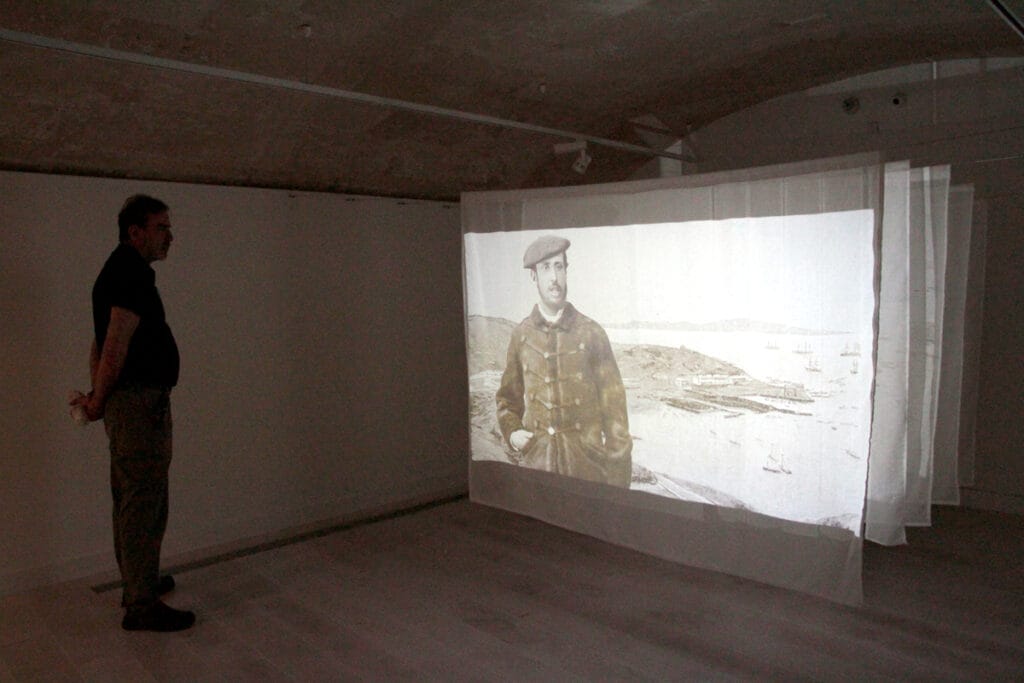 Man looking at Saturnino Ximénez Enrich as a young man - exhibition Saturnismo by Marijo Ribas